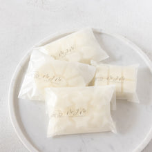 Load image into Gallery viewer, Four wax melts snap bars displays on a textured tray