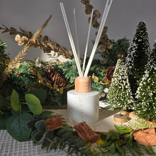 Load image into Gallery viewer, Diffuser with decorative elements to depict the festive scent of Nordic Cedar