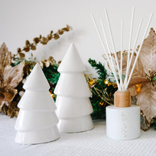 Load image into Gallery viewer, Decorative items including white ceramic trees and a diffuser with a wooden base on a textured surface.
